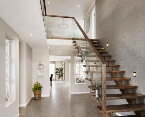 Large, luxury entry with staircase