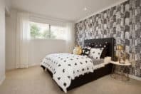 modern bedroom with tiled feature wall