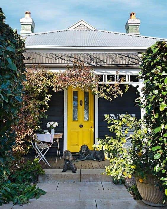 Home exterior Colour Ideas - Pop Colours, yellow front door.